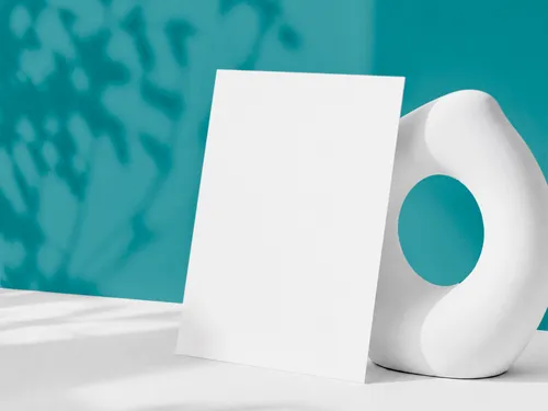 Free Poster Mockup Leaning Against Sculptural Vase — Teal Botanical Shadow (PSD) alternate mockup preview