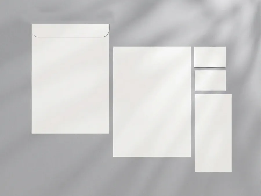 FREE STATIONERY MOCKUP FLAT LAY — ENVELOPE LETTERHEAD CARDS OVERHEAD (PSD) mockup preview 4