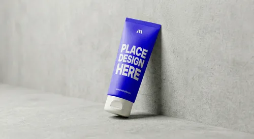Free Face Wash Tube Mockup Leaning Against Concrete Wall (PSD) mockup preview