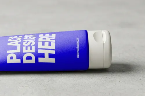 Free Face Wash Tube Mockup Lying On Concrete — Side View (PSD) mockup preview