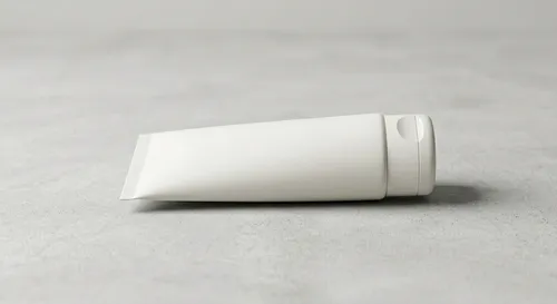 Free Face Wash Tube Mockup Lying On Concrete — Side View (PSD) alternate mockup preview