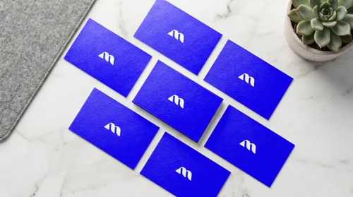 Free Business Card Flat Lay Mockup — Multi Card Marble Scatter (PSD) mockup preview