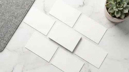 Free Business Card Flat Lay Mockup — Multi Card Marble Scatter (PSD) alternate mockup preview