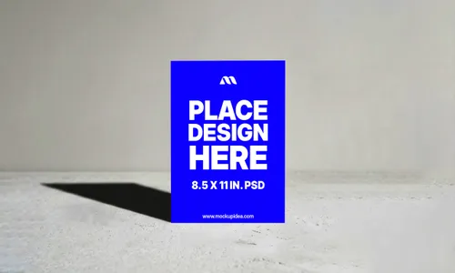 8.5x11 Flyer Mockup Standing On Concrete — Dramatic Shadow (PSD) mockup preview
