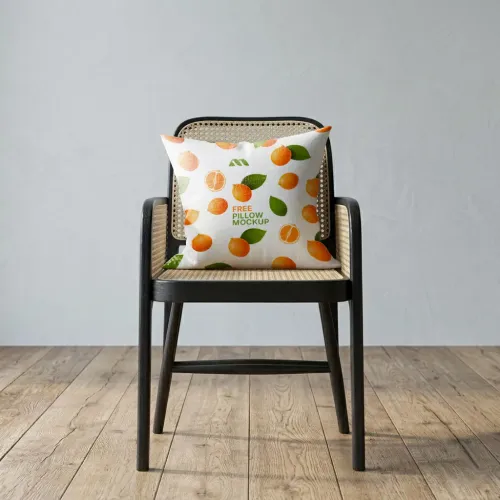 Free Throw Pillow Mockup On Rattan Accent Chair (PSD) mockup preview