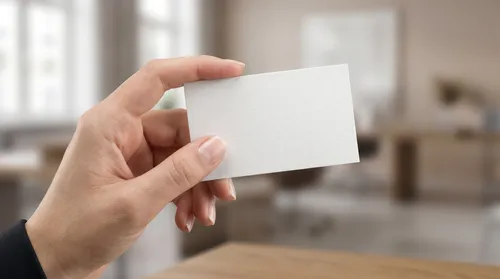 Free Business Card Mockup Held In Hand — Office Interior Scene (PSD) alternate mockup preview