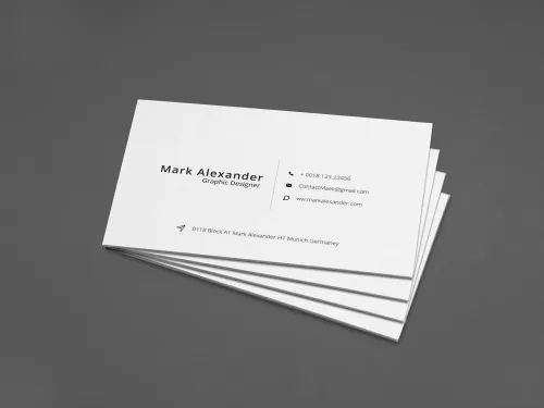 Stack of white business cards fanned out on dark grey gradient  background with realistic paper shadow