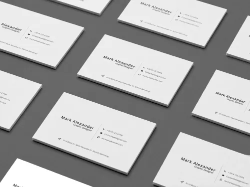 Multiple white business cards arranged in a repeating diagonal  grid pattern on grey background, top-down view
