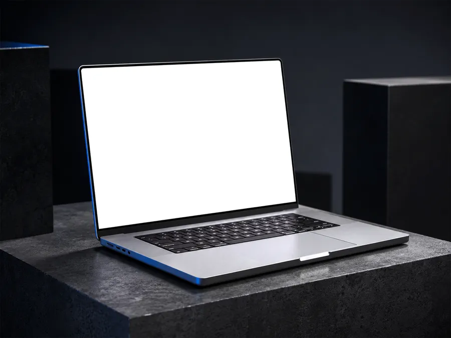 FREE MACBOOK PRO MOCKUP ON DARK STONE PEDESTAL — CINEMATIC SCENE (PSD) mockup preview 2