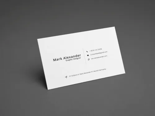 White business card mockup floating at an angle on dark grey  gradient background with realistic shadow